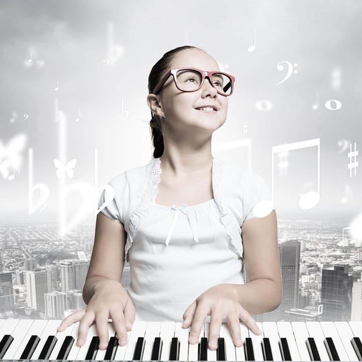 Young girl learning piano