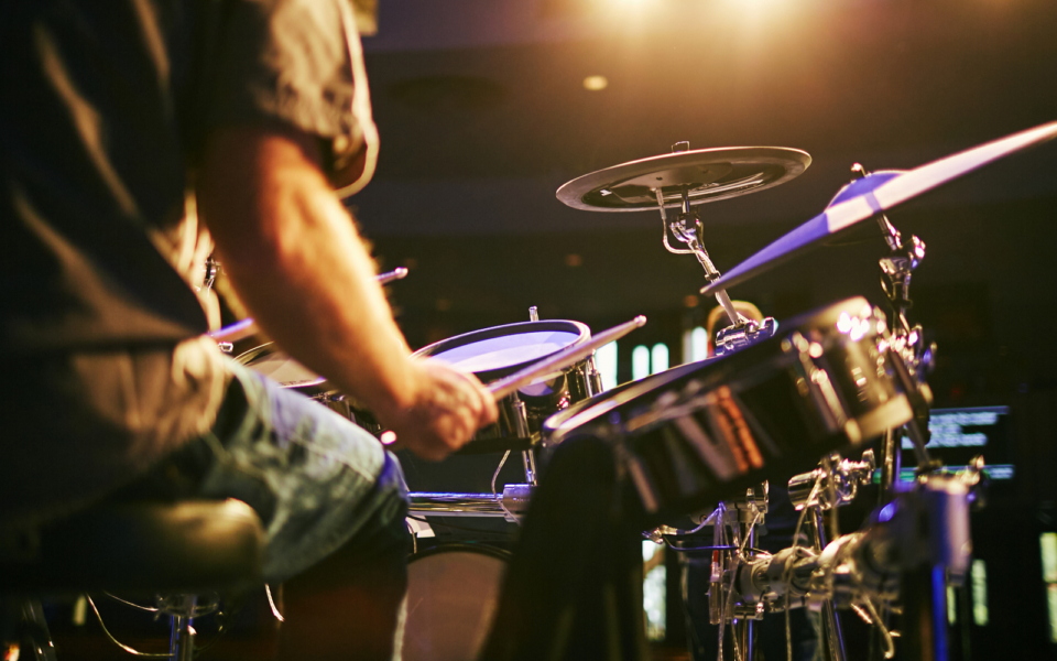 Playing drums in a band live